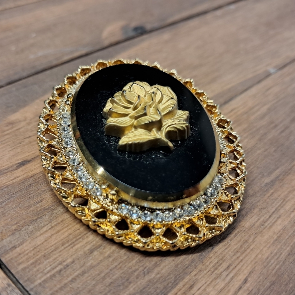 Vintage Celebrity NY Gold and Black Floral Brooch